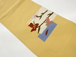 色紙に抽象花葉模様織出し名古屋帯